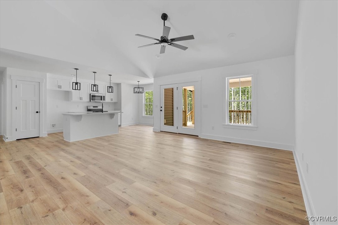 14954 Lebanon Road Spring Grove, VA 23881 - Photo 9 of 29 Unfurnished living room featuring a ceiling fan, a