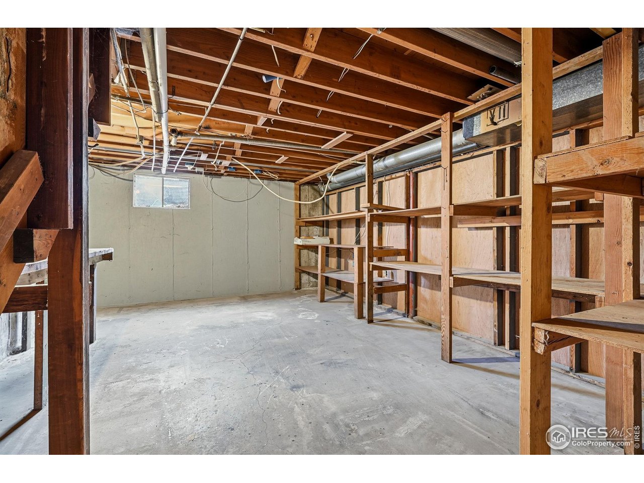 4595 Moorhead Avenue Boulder, CO 80305 - Photo 30 of 40 a view of an empty room with wooden floor