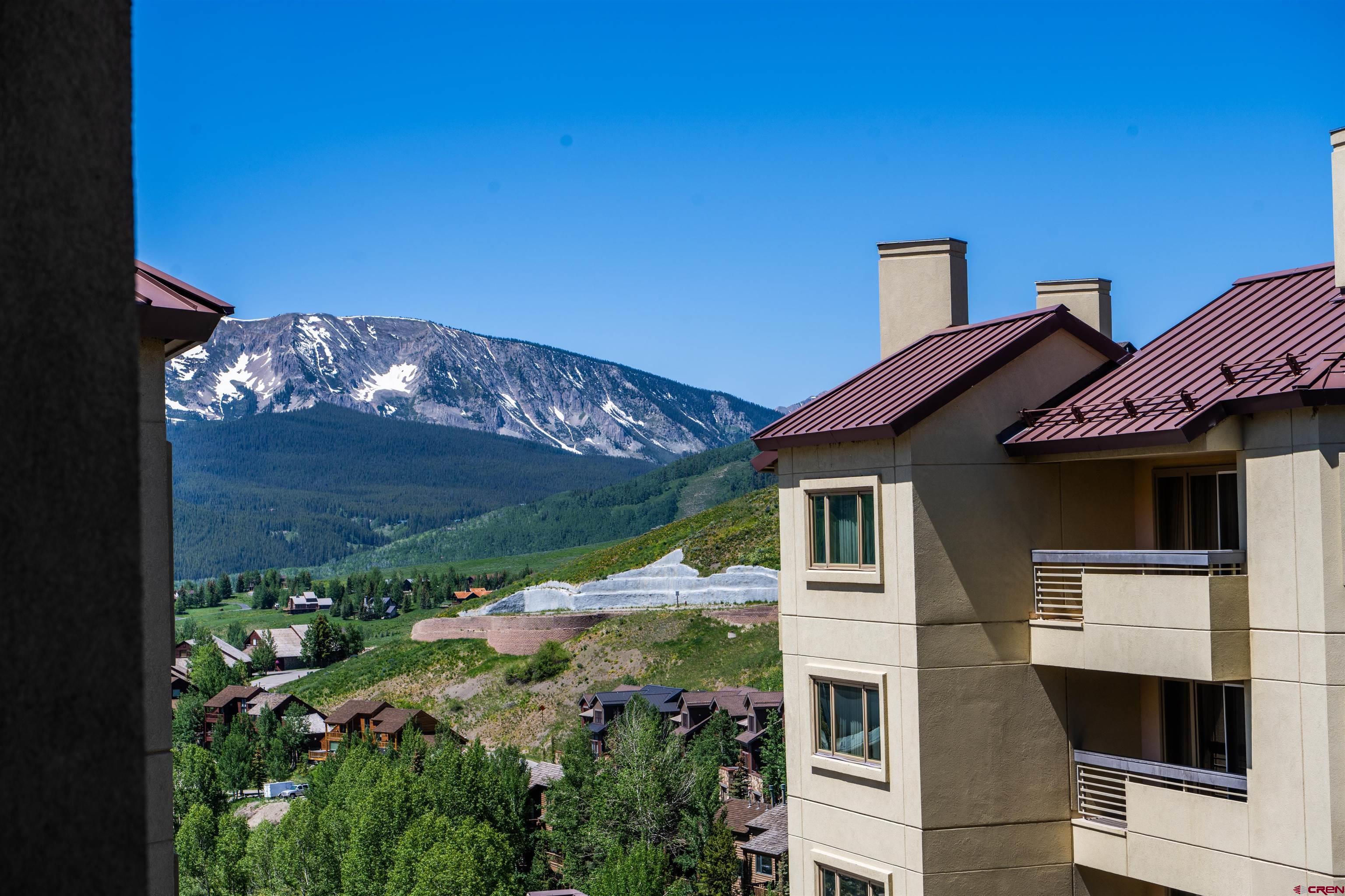 500 Gothic Road, Unit 539 Crested Butte, CO 81225 - Photo 15 of 20 a view of a house with a yard
