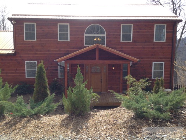 620 Green Knob Mountain Road Boone, NC 28607 - Photo 13 of 43 a front view of a house with garden