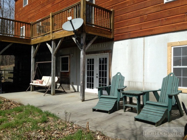 620 Green Knob Mountain Road Boone, NC 28607 - Photo 31 of 43 a view of a chairs and table in a patio