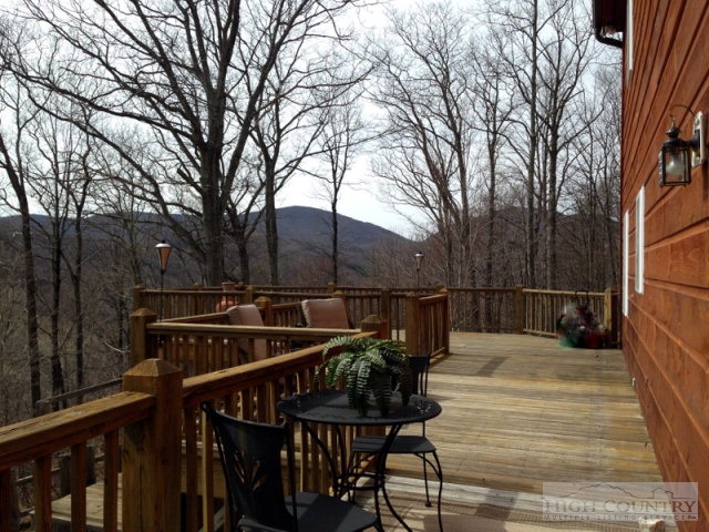 620 Green Knob Mountain Road Boone, NC 28607 - Photo 36 of 43 a view of a chairs and table on the deck