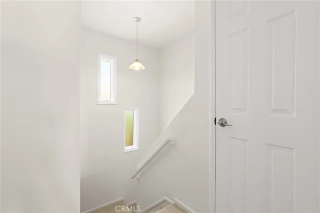 a view of a hallway with front door