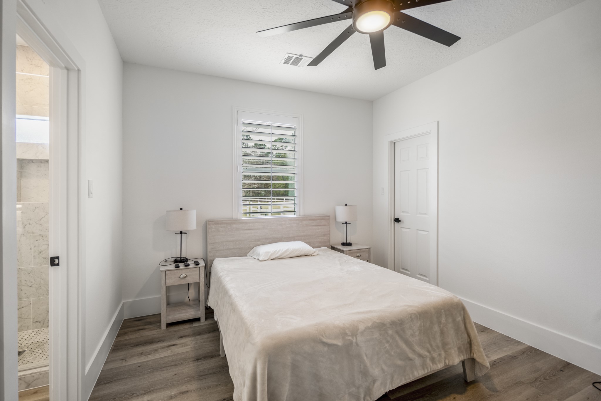 31219 Edgewater Drive Magnolia, TX 77354 - Photo 25 of 49 a bedroom with a bed and a window