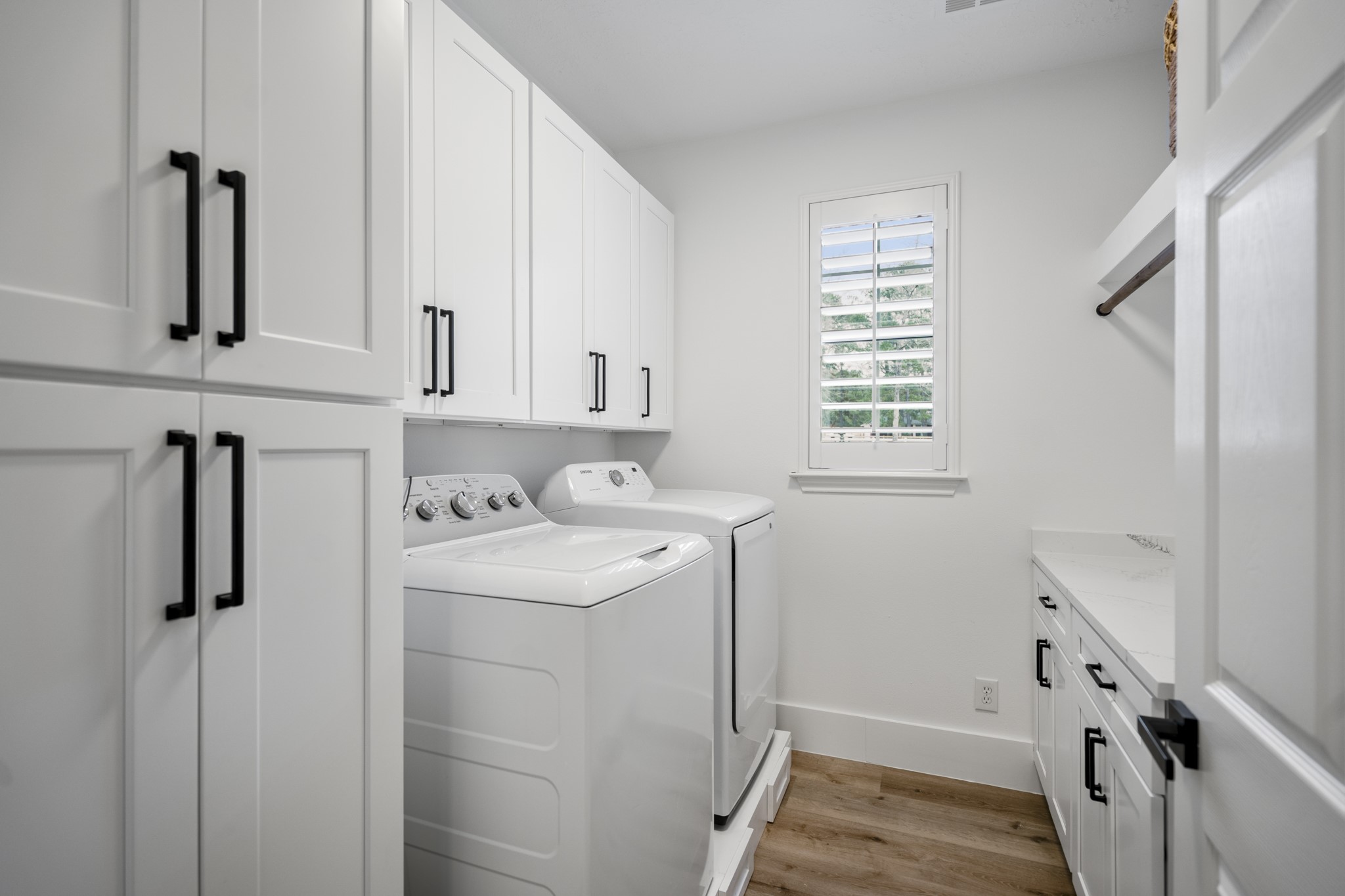 31219 Edgewater Drive Magnolia, TX 77354 - Photo 28 of 49 a view of a storage and utility room with washer and dryer