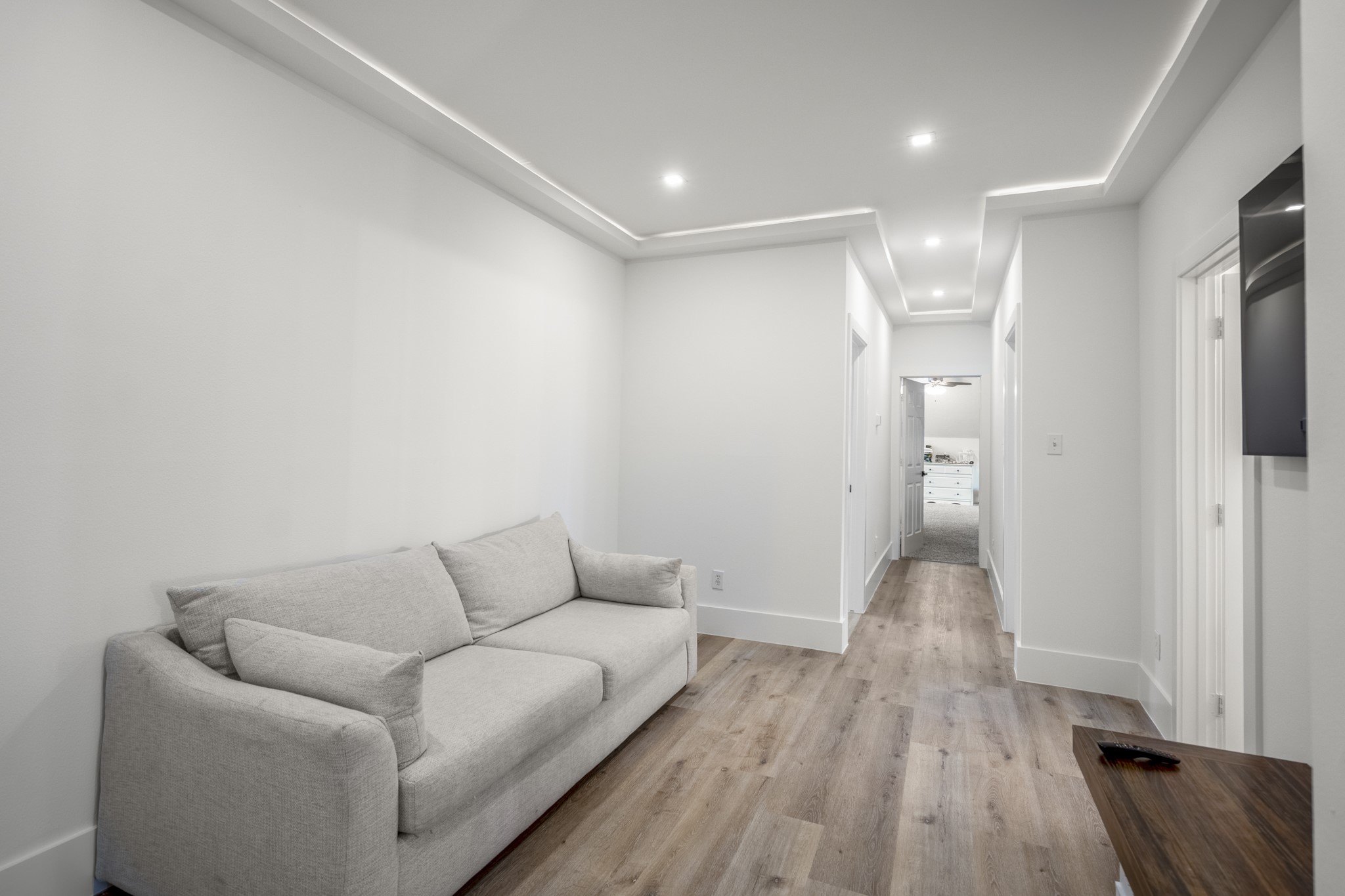 31219 Edgewater Drive Magnolia, TX 77354 - Photo 30 of 49 a living room with furniture and a wooden floor