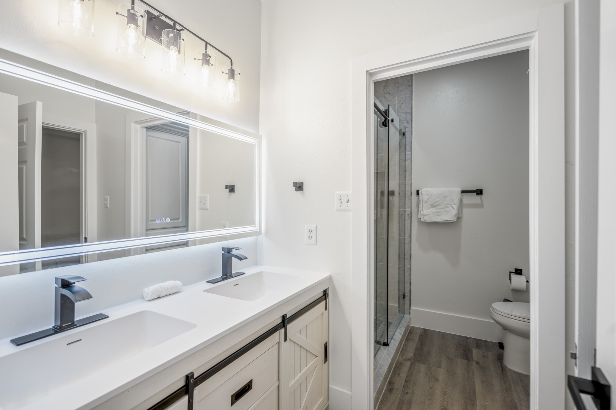 31219 Edgewater Drive Magnolia, TX 77354 - Photo 32 of 49 a bathroom with a sink a toilet and shower