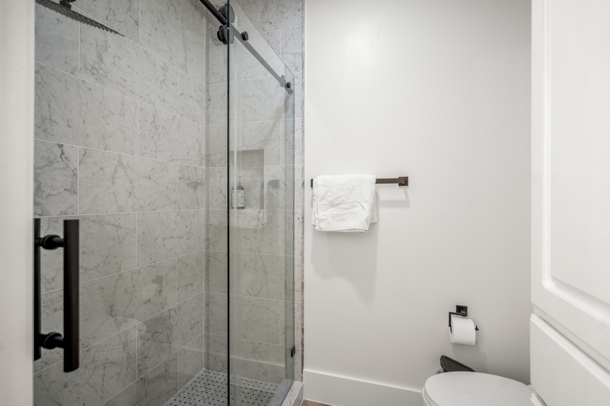 31219 Edgewater Drive Magnolia, TX 77354 - Photo 33 of 49 a bathroom with a shower and toilet