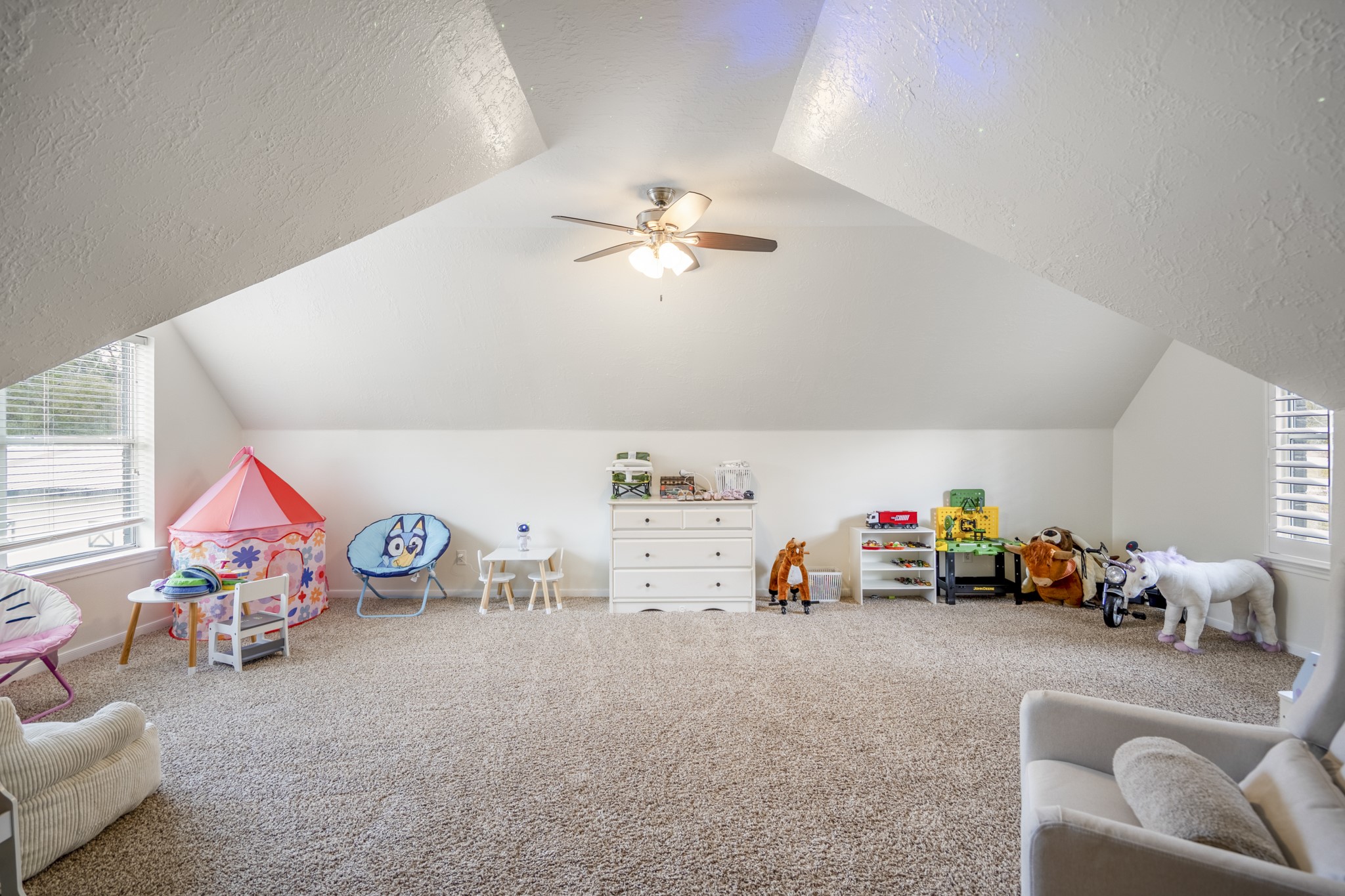 31219 Edgewater Drive Magnolia, TX 77354 - Photo 36 of 49 a view of play room with toys and ceiling fan