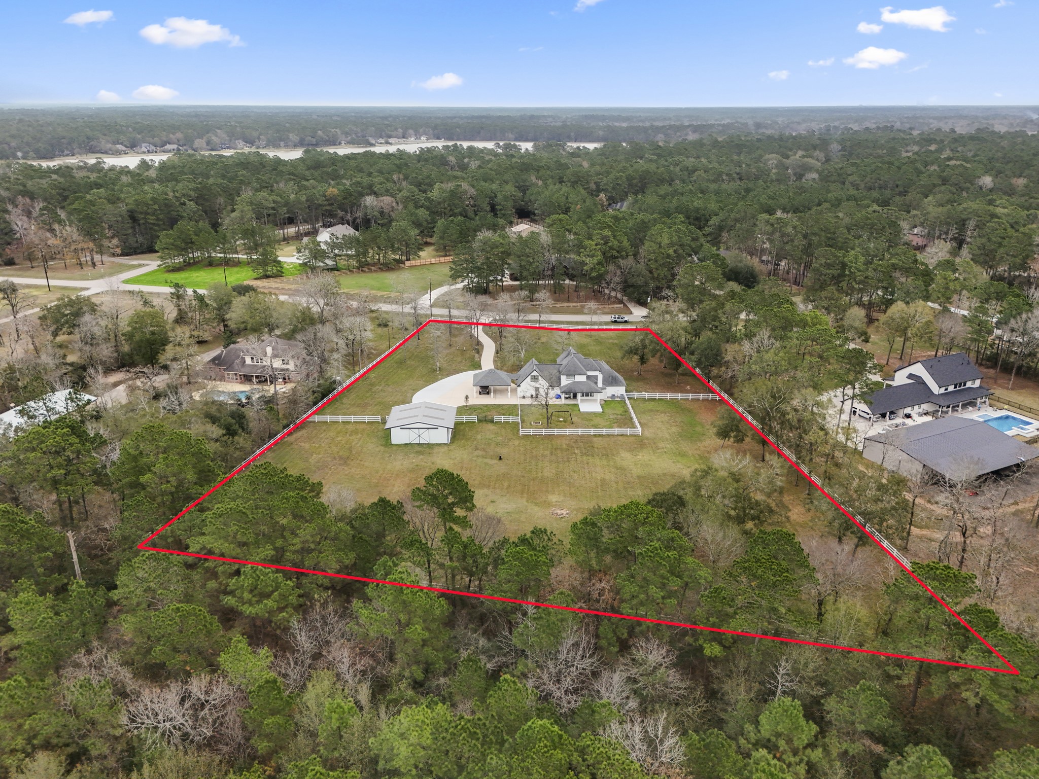 31219 Edgewater Drive Magnolia, TX 77354 - Photo 45 of 49 a view of a swimming pool and lake view