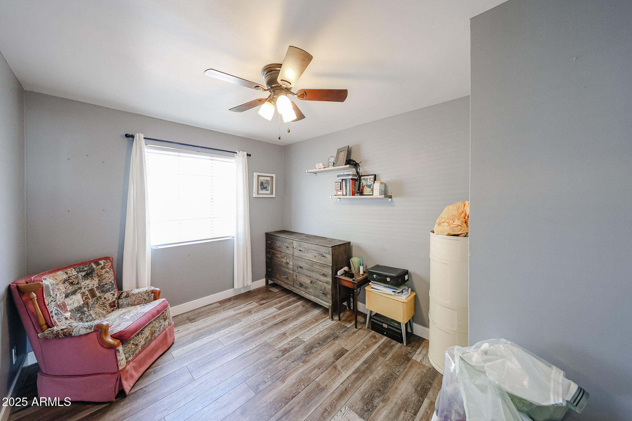 2037 West State Avenue Phoenix, AZ 85021 - Photo 8 of 18 a living room with furniture and a window