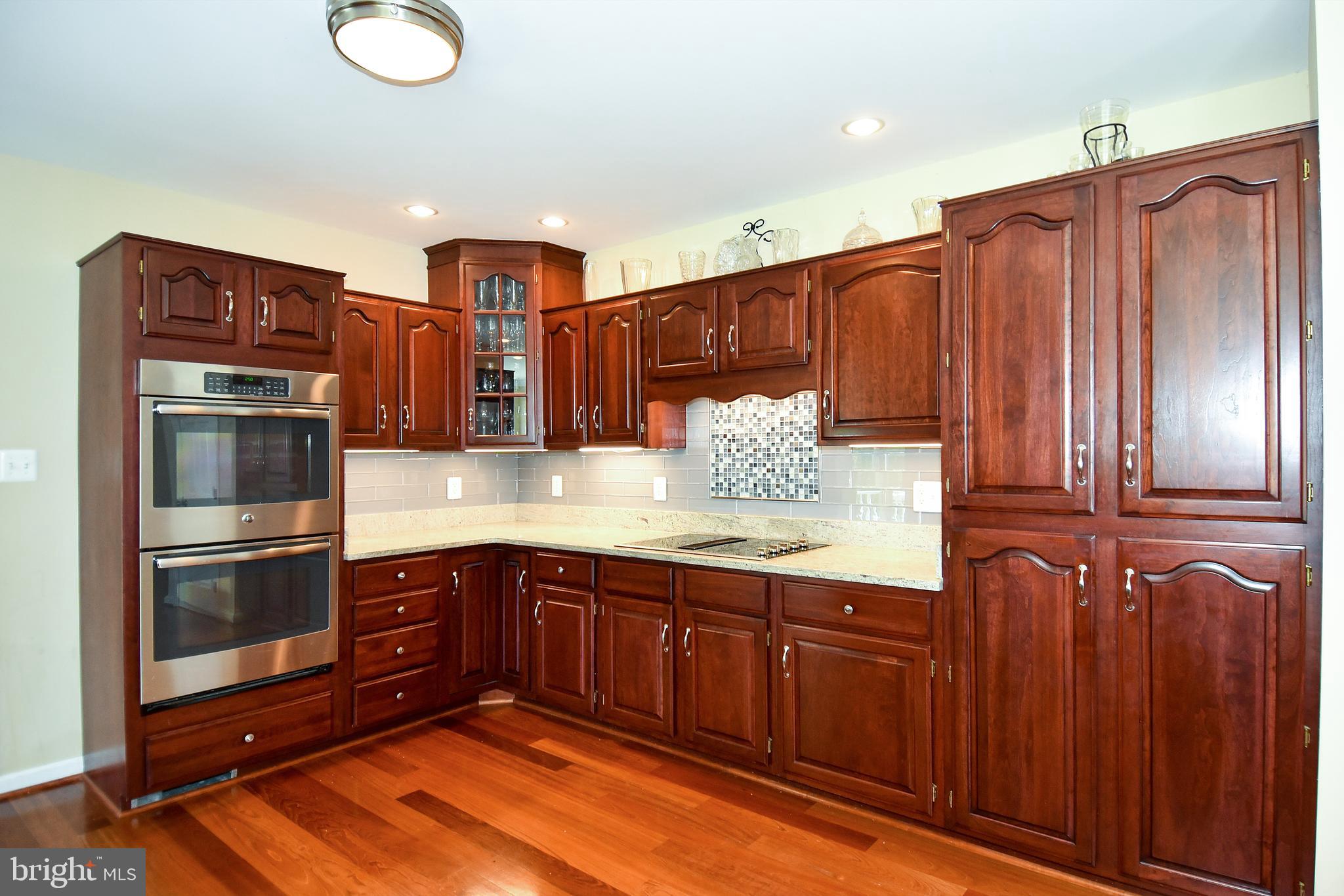 18106 Canby Road Leesburg, VA 20175 - Photo 29 of 65 Stainless steel double ovens and electric cooktop