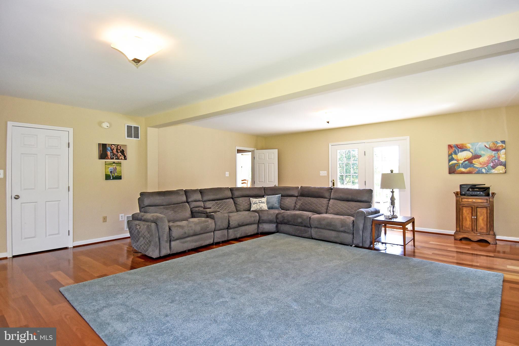 18106 Canby Road Leesburg, VA 20175 - Photo 33 of 65 Great Room opens to kitchen and rear deck