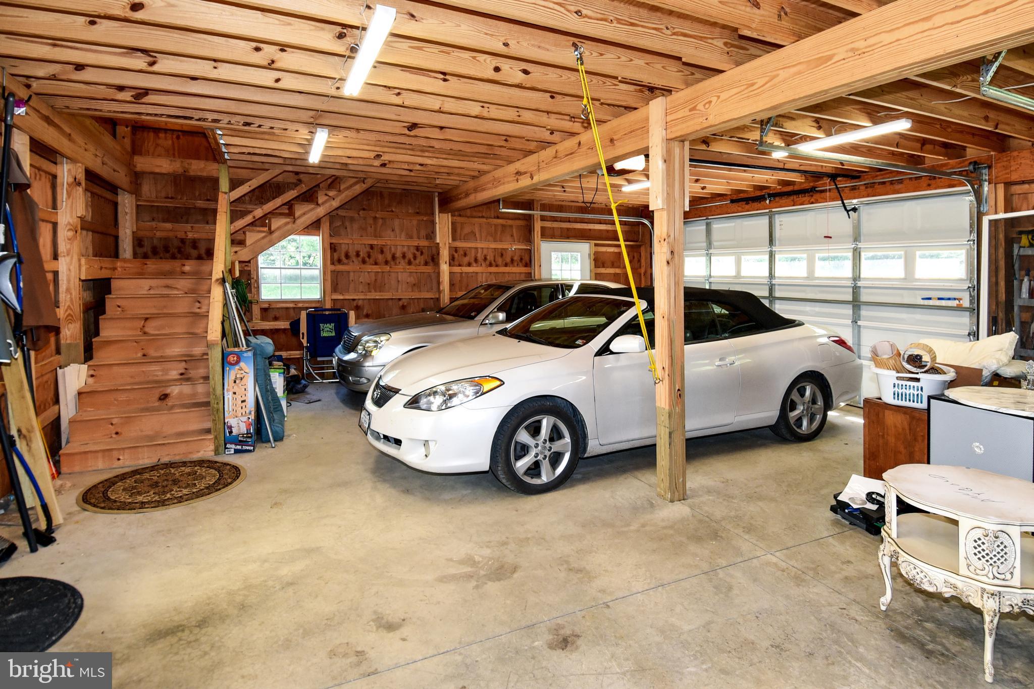 18106 Canby Road Leesburg, VA 20175 - Photo 60 of 65 3-car garage with an additional 900 SF upstairs