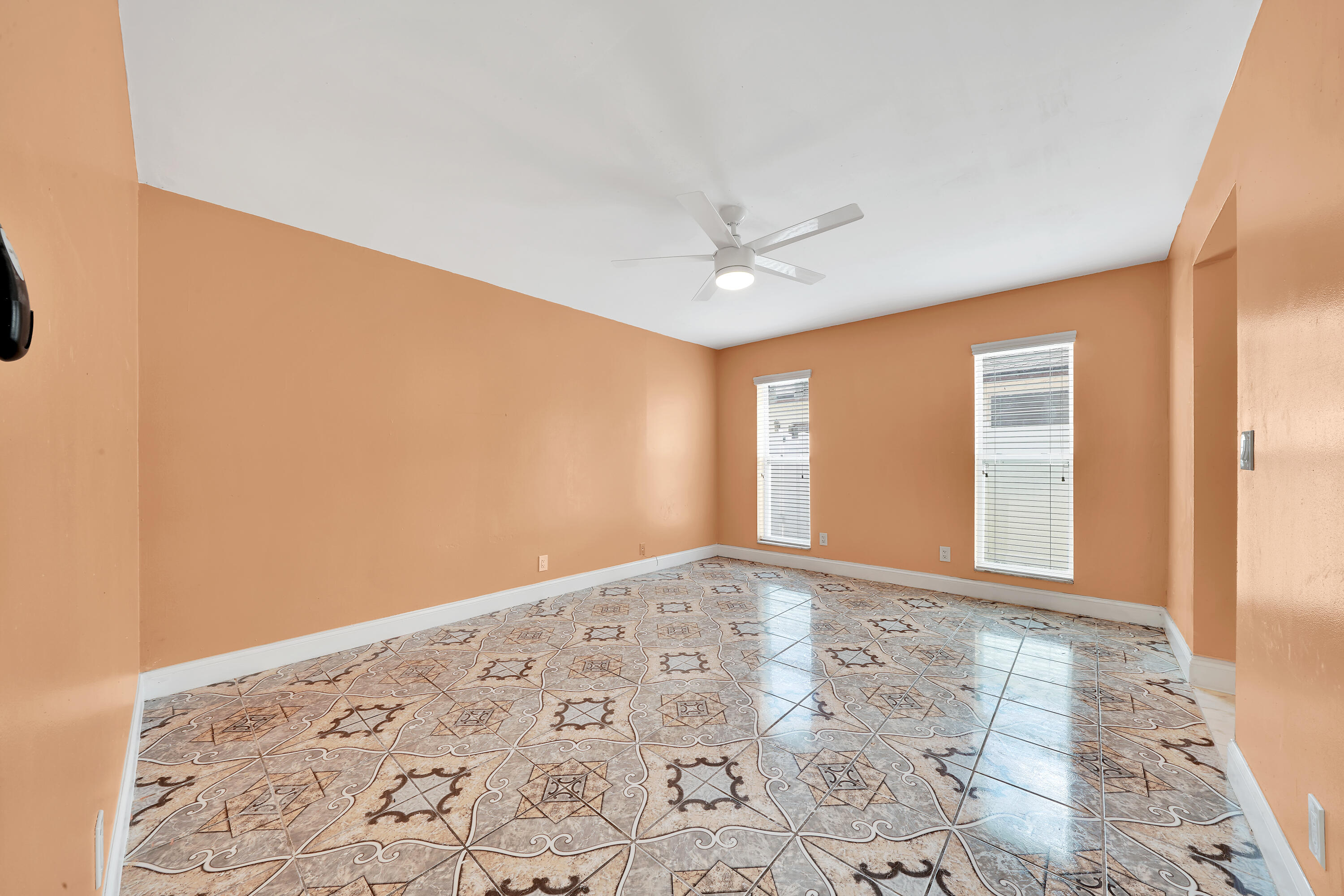 724 Ave Chaumont Delray Beach, FL 33445 - Photo 15 of 35 a view of a big room with windows and closet