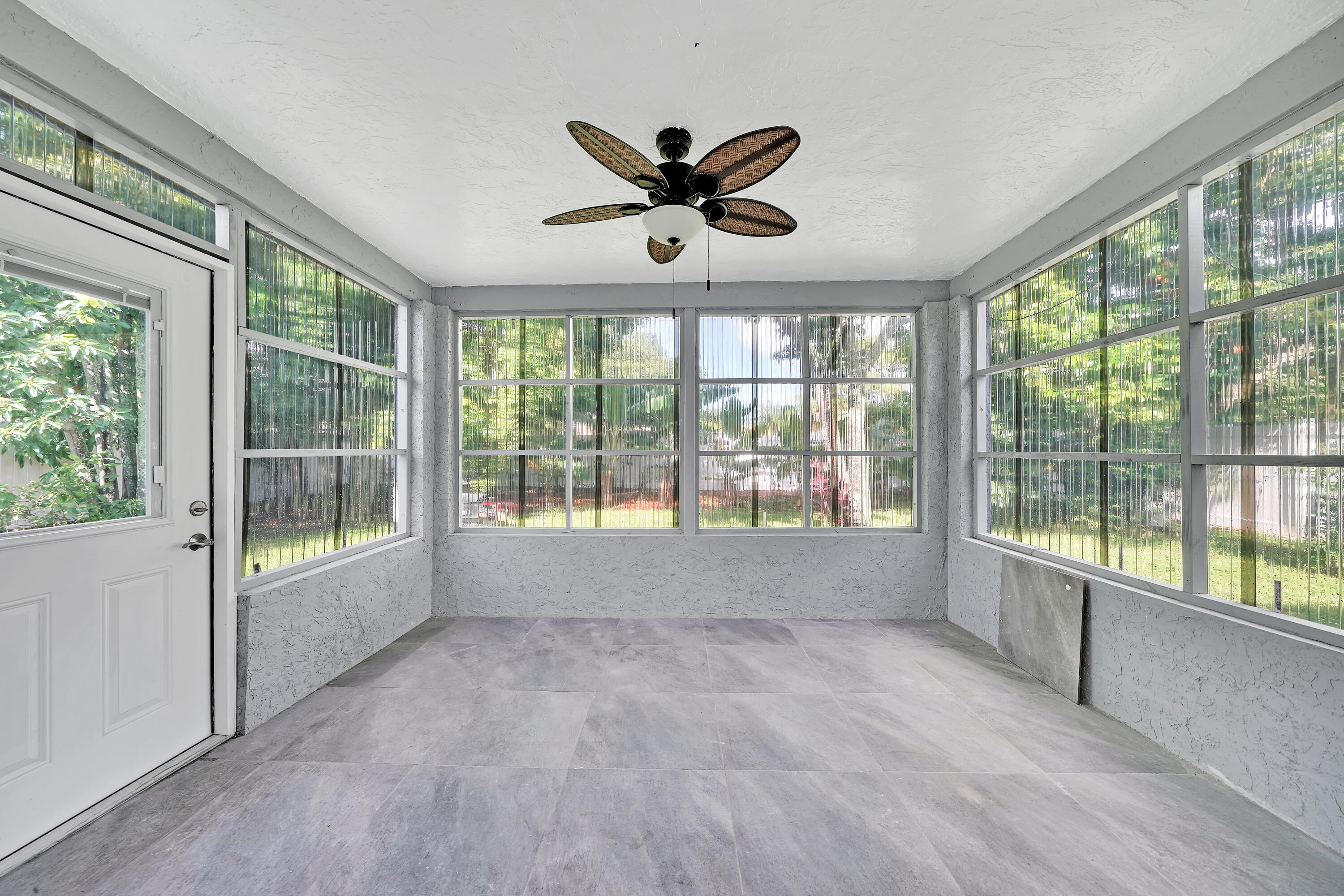 724 Ave Chaumont Delray Beach, FL 33445 - Photo 22 of 35 a view of an empty room with a window