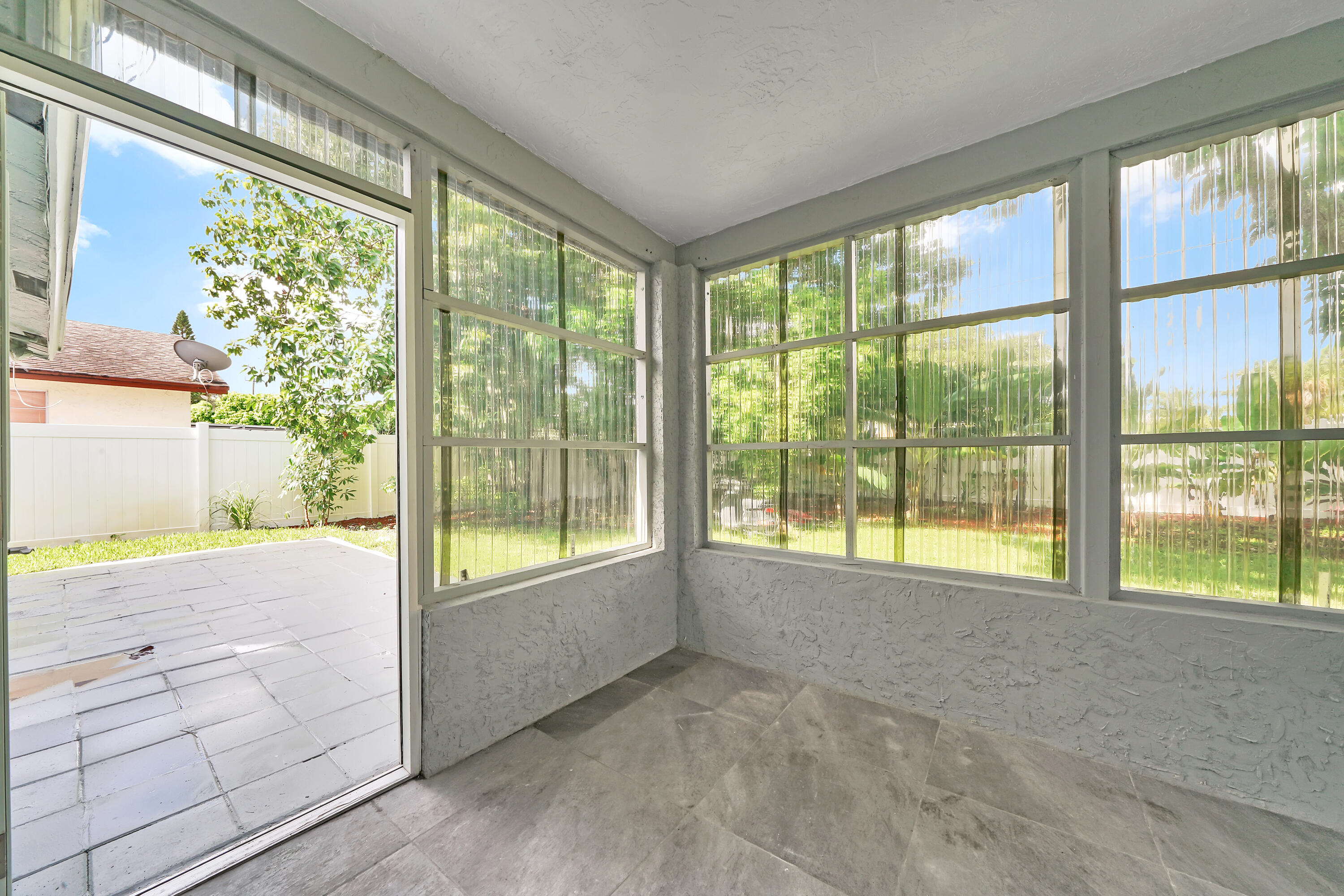 724 Ave Chaumont Delray Beach, FL 33445 - Photo 24 of 35 a view of an empty room and a window