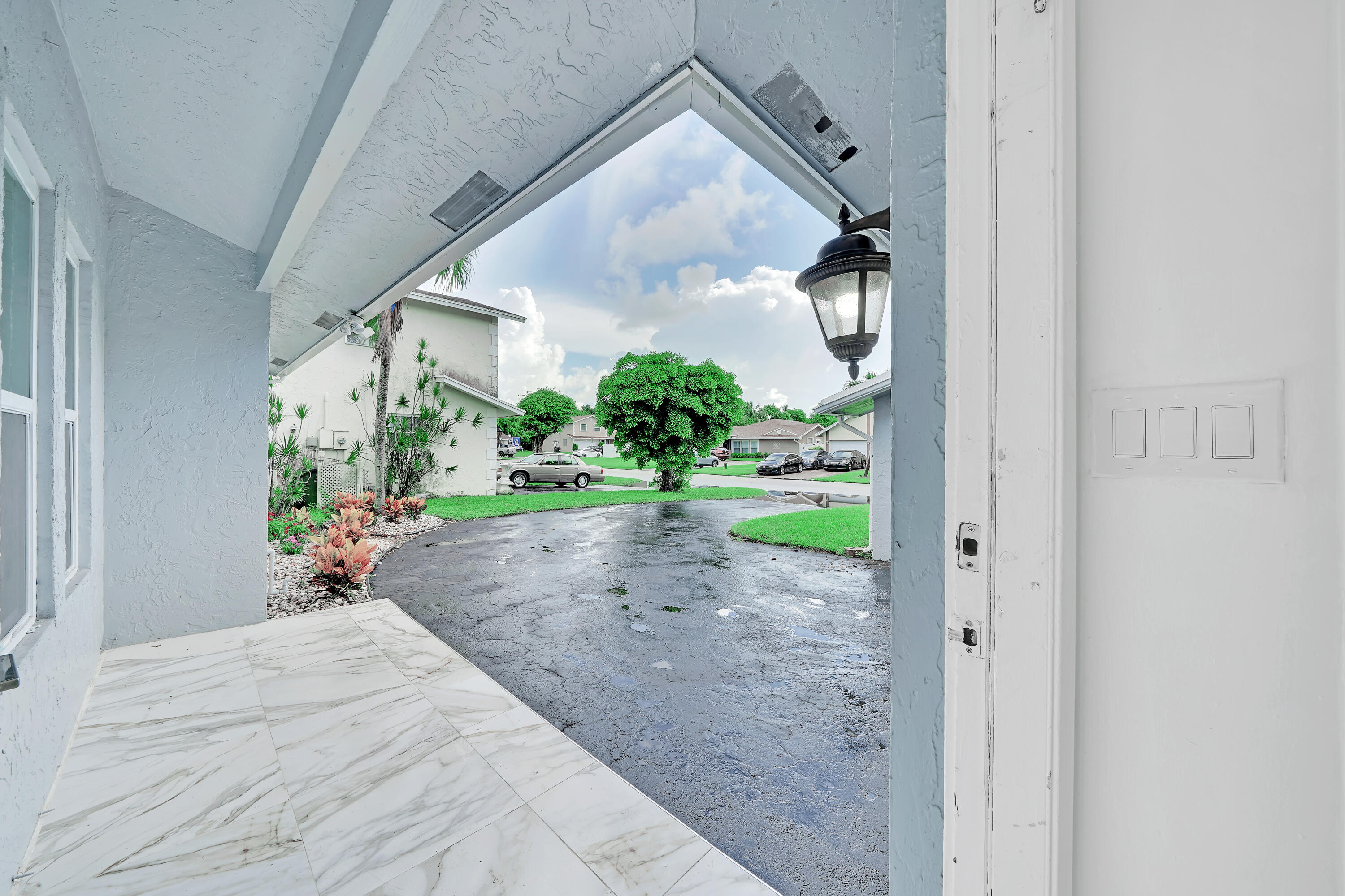 724 Ave Chaumont Delray Beach, FL 33445 - Photo 29 of 35 a view of a backyard of the house