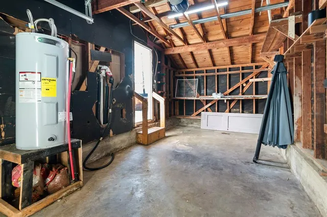 a front view of a house with a garage