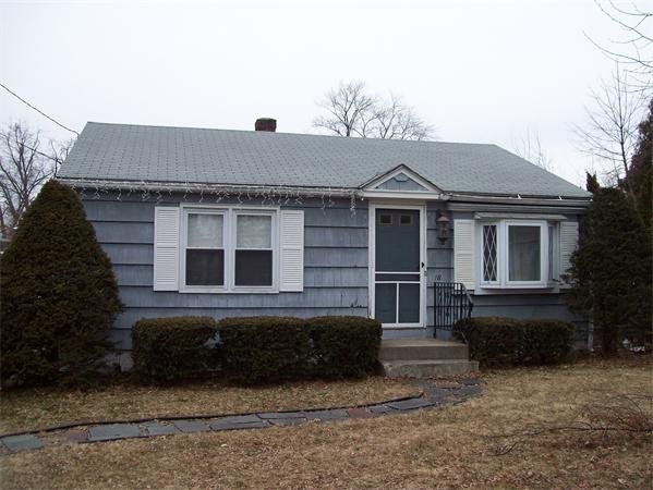 18 Embury Street Springfield, MA 01109 - Photo 2 of 14 a front view of a house with a yard