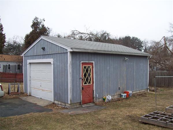 18 Embury Street Springfield, MA 01109 - Photo 5 of 14 a view of outdoor space and front view of a house