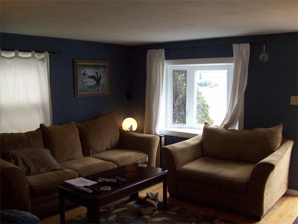 18 Embury Street Springfield, MA 01109 - Photo 6 of 14 a living room with furniture and a window