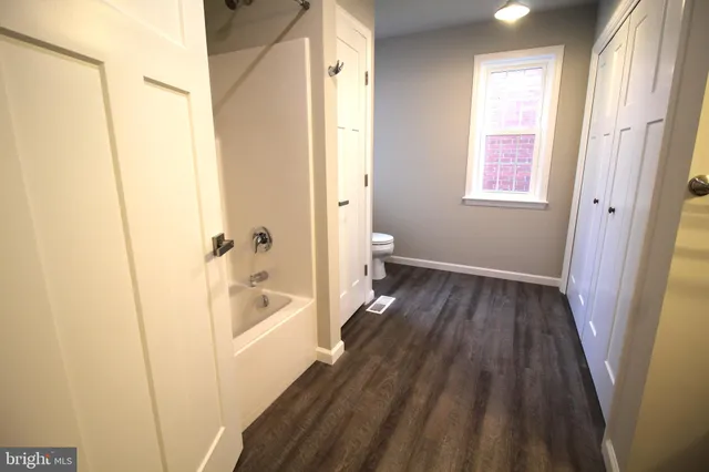 a bathroom with a sink a bath tub and a shower