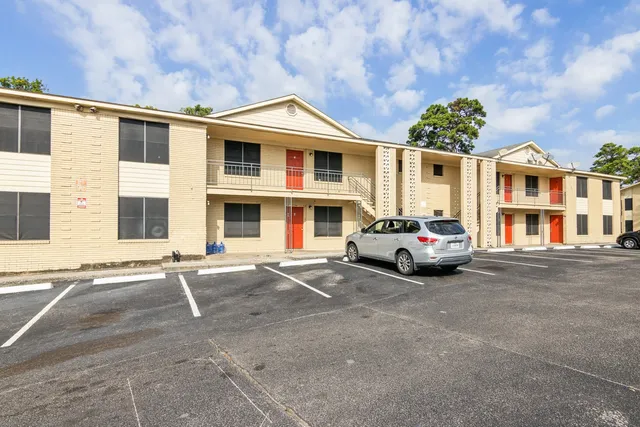 a car parked in front of a house