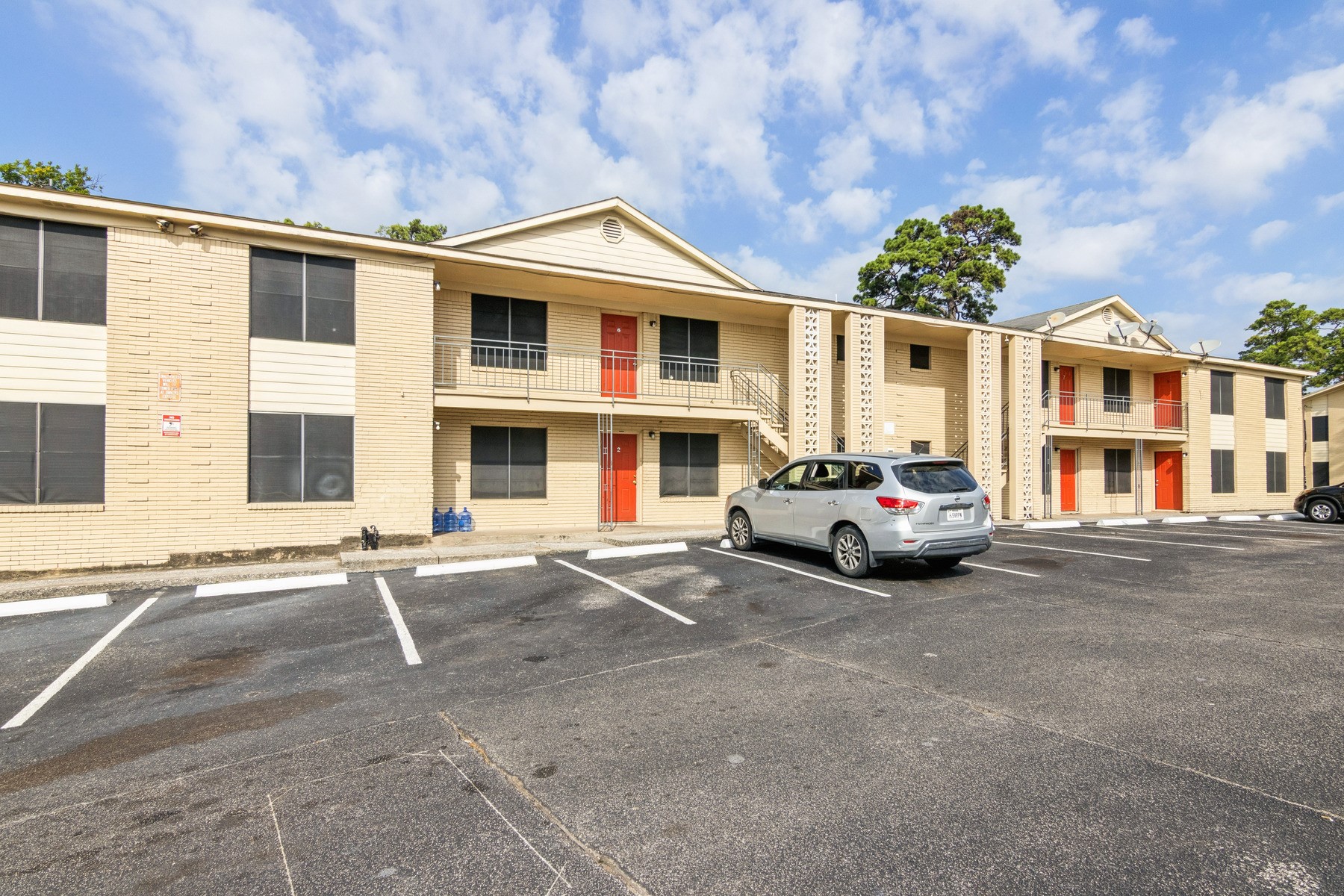 3631 North MacGregor Way, Unit 7 Houston, TX 77004 - Photo 2 of 12 a car parked in front of a house