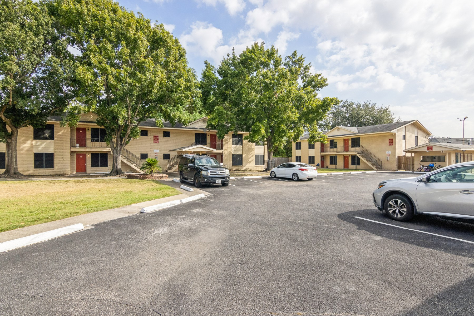 3631 North MacGregor Way, Unit 7 Houston, TX 77004 - Photo 3 of 12 a view of a street with cars