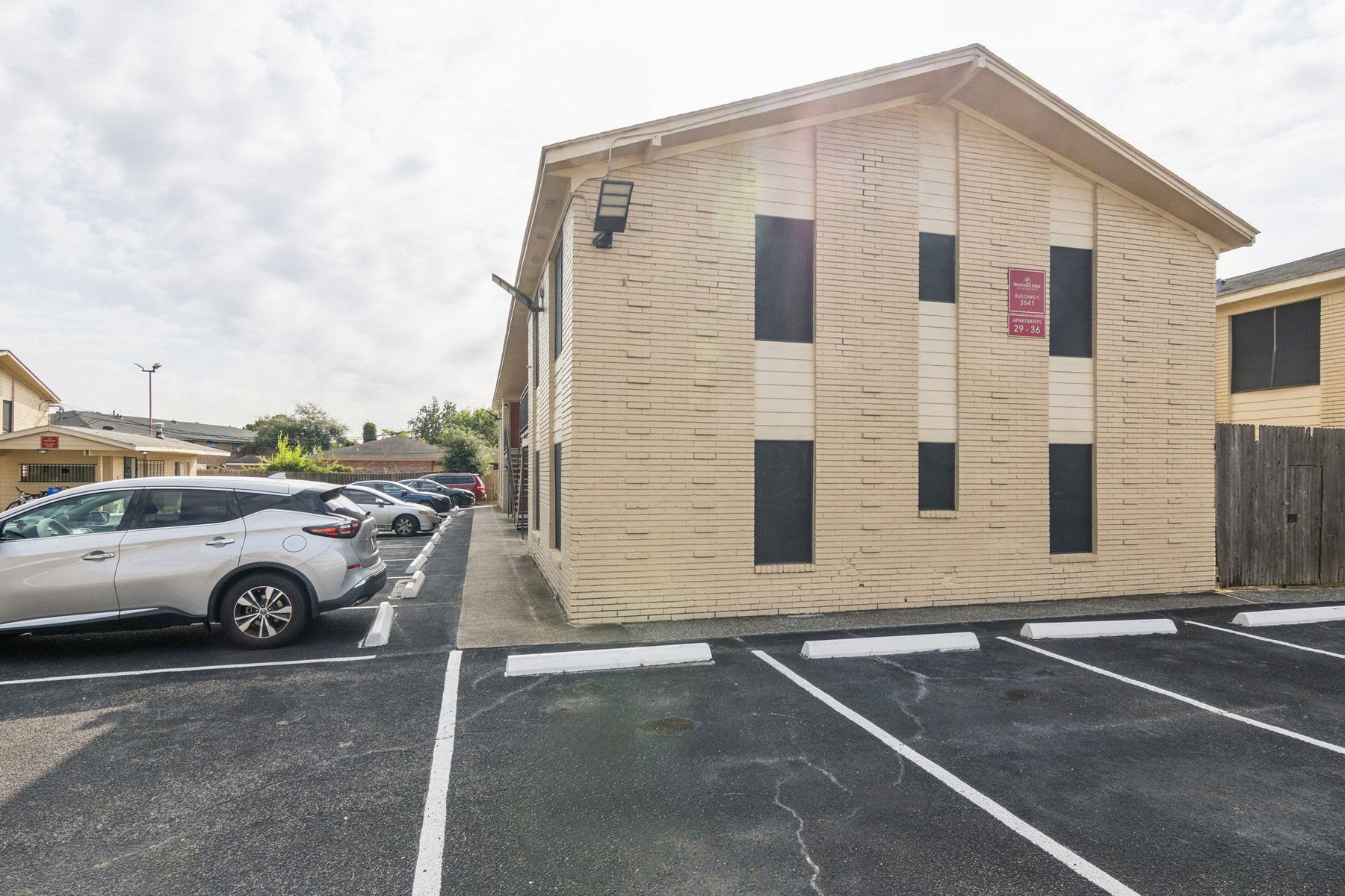 3631 North MacGregor Way, Unit 7 Houston, TX 77004 - Photo 4 of 12 a front view of a house with parking area