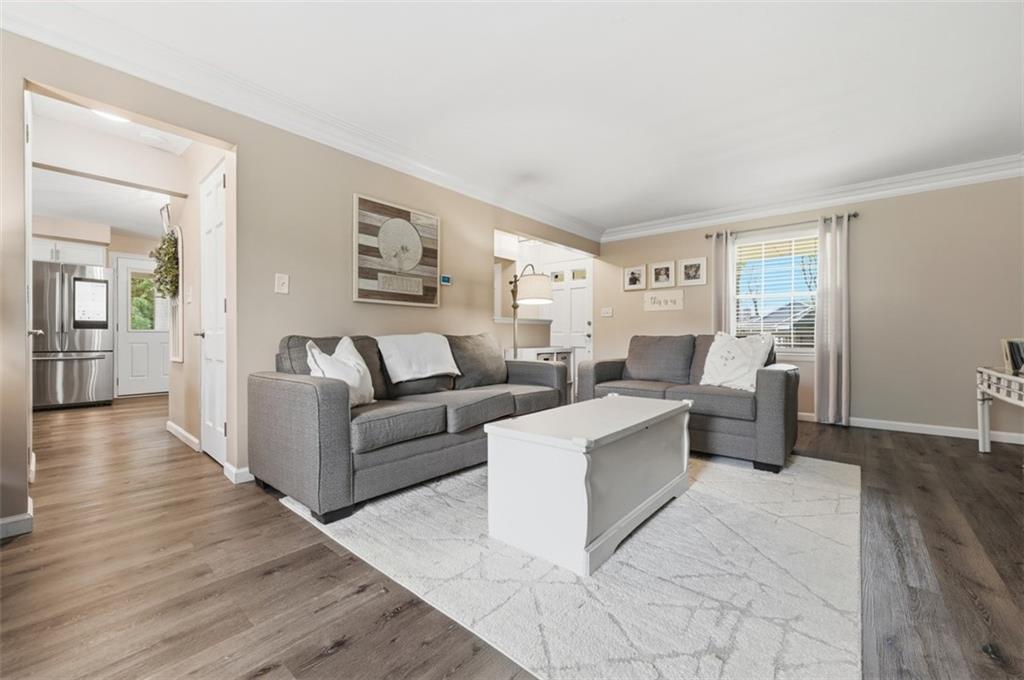 129 Meadowbrook Road Renfrew, PA 16053 - Photo 11 of 45 a living room with furniture and wooden floor