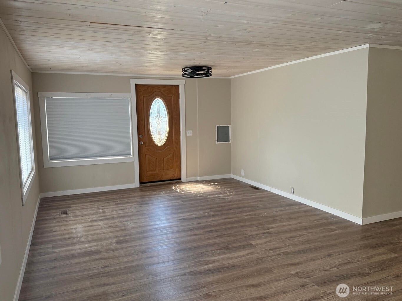 708 North Ridge Street Chewelah, WA 99109 - Photo 5 of 29 a view of empty room with wooden floor and window