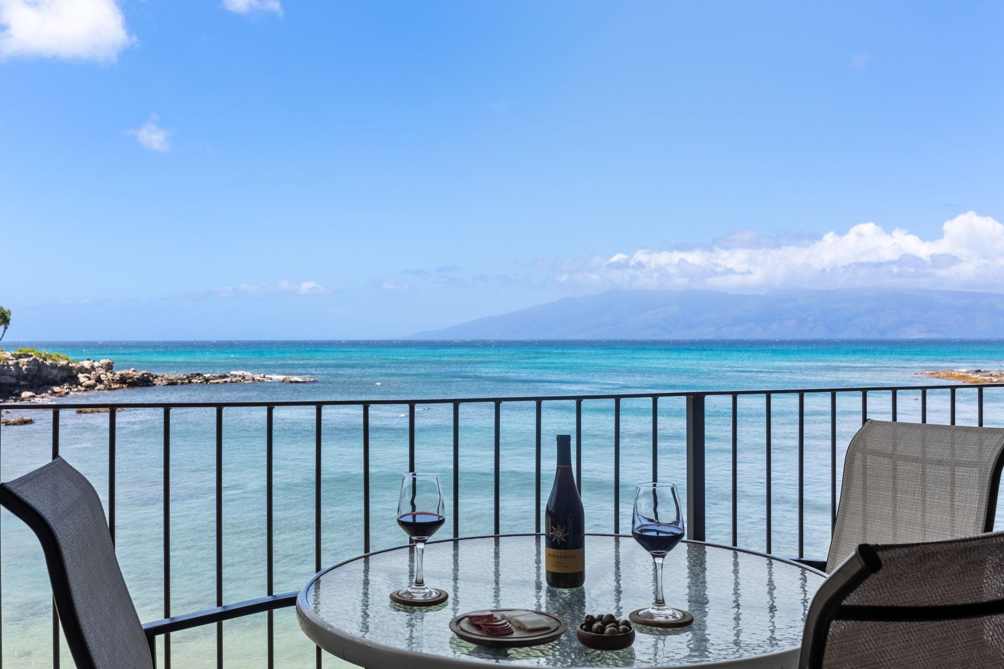 a view of a balcony with chairs