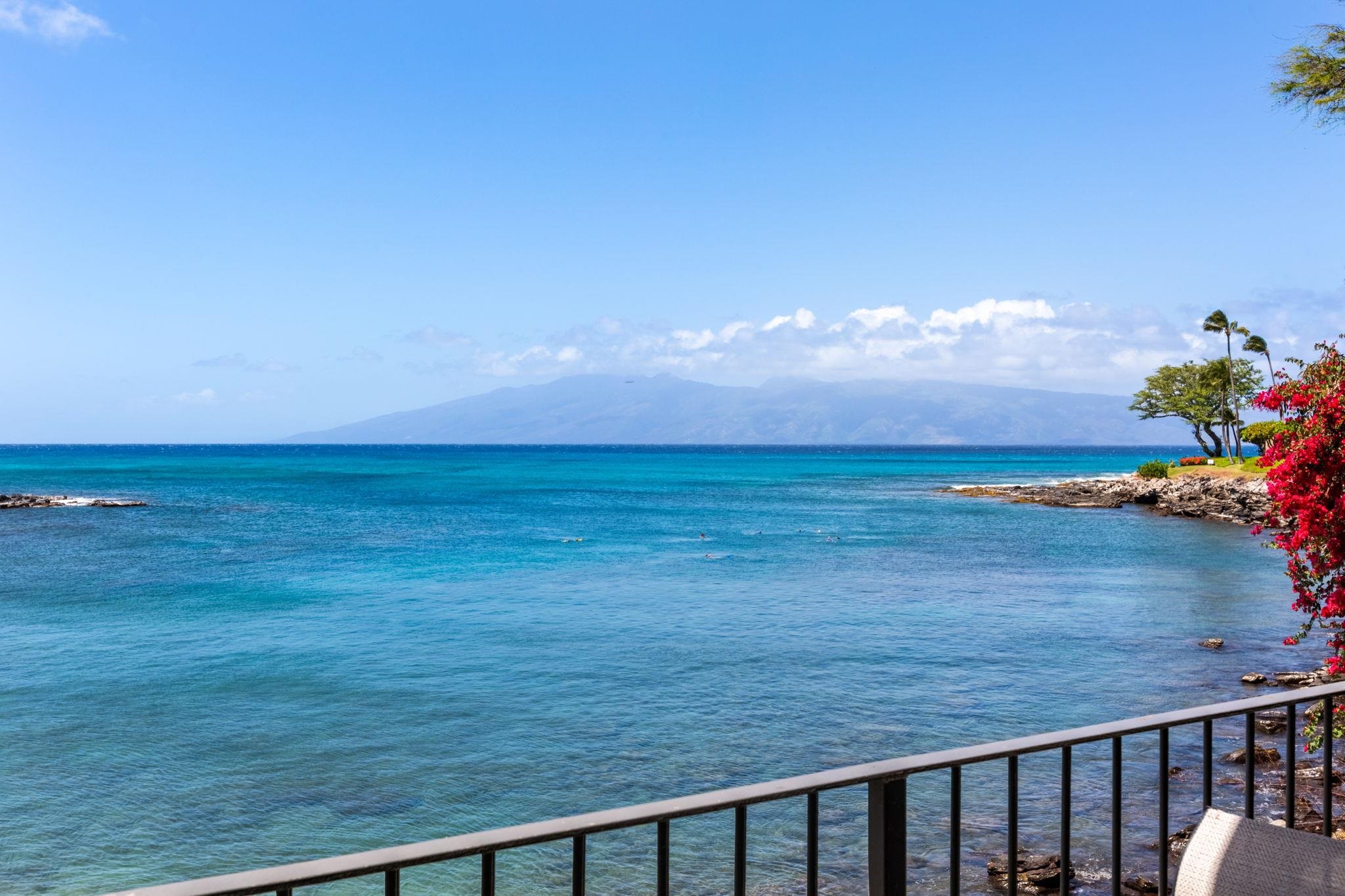 5255 Lower Honoapiilani Road, Unit 119 Lahaina, HI 96761 - Photo 11 of 22 a view of an ocean from a balcony