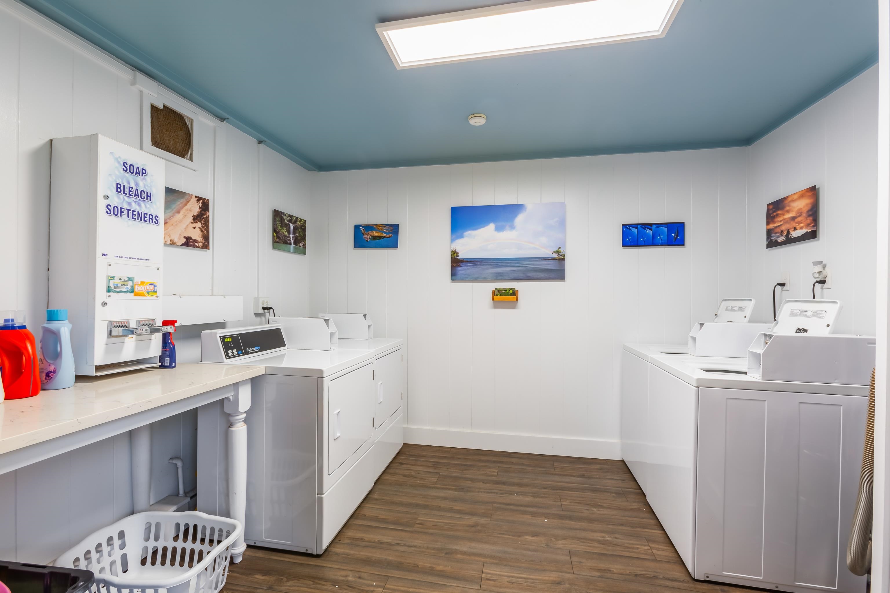 5255 Lower Honoapiilani Road, Unit 119 Lahaina, HI 96761 - Photo 20 of 22 a view of kitchen with stainless steel appliances cabinets and wooden floor