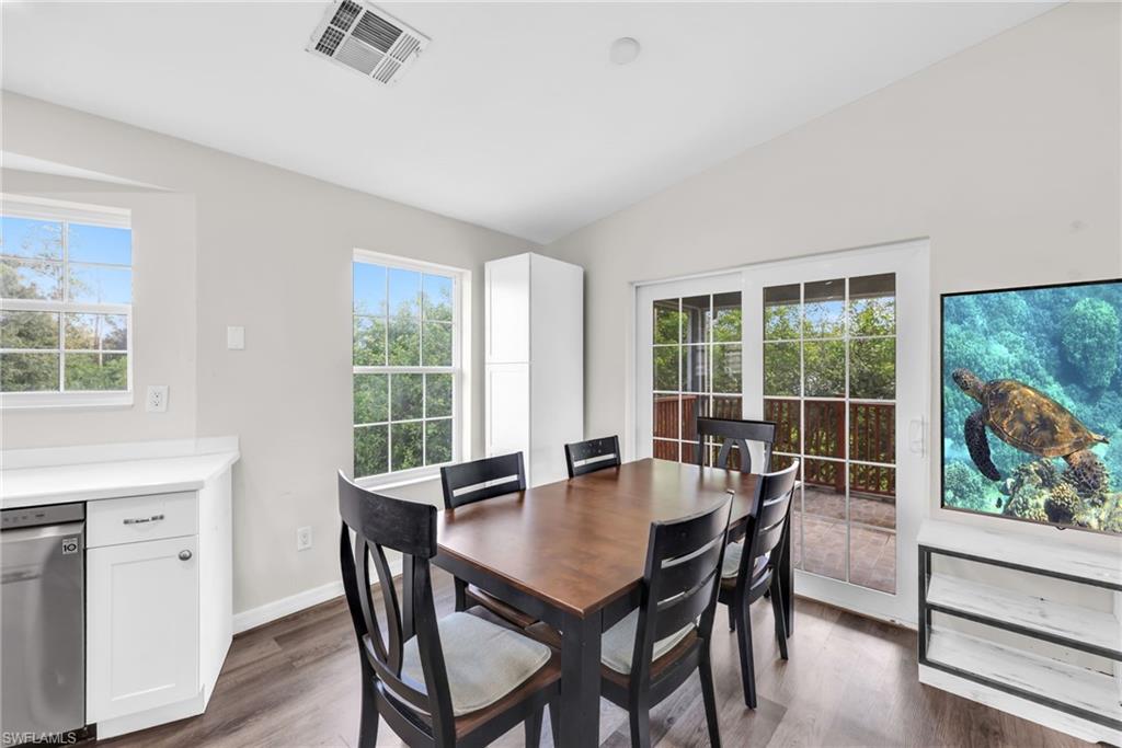 4015 16th Avenue Southeast Naples, FL 34117 - Photo 14 of 22 a view of a dining room with furniture window and outside view
