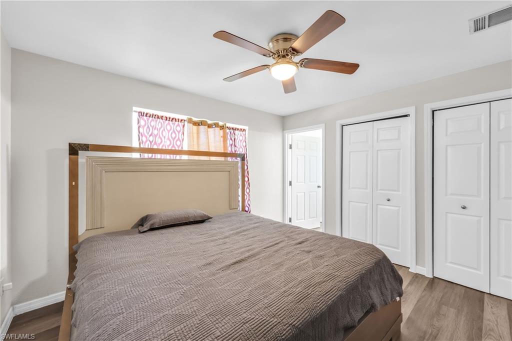 4015 16th Avenue Southeast Naples, FL 34117 - Photo 6 of 22 a bedroom with a bed and a window