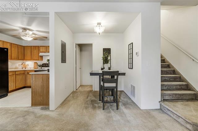 2002 Legacy Ridge View, Unit 112 Colorado Springs, CO 80910 - Photo 15 of 37 Adjacent to dining and door to basement