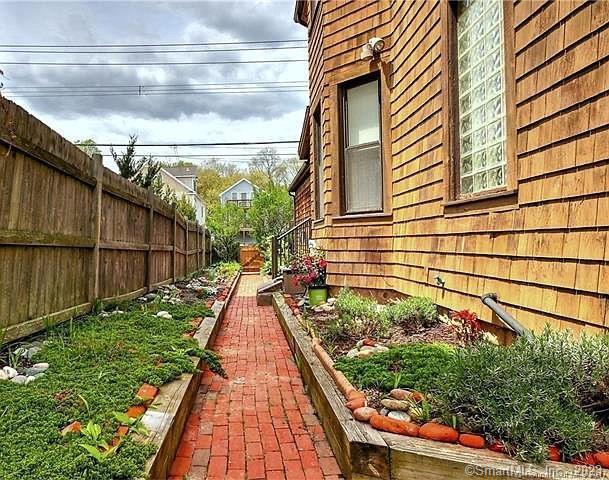 15 Merwin Avenue Milford, CT 06460 - Photo 19 of 23 a view of a backyard with sitting area