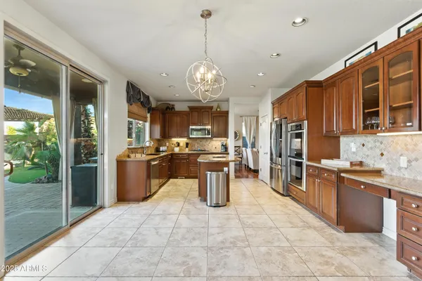 a kitchen with a stove and a cabinet