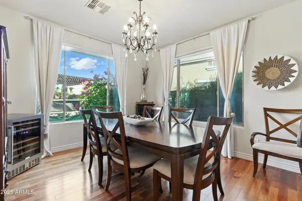 a bedroom with a bed and a lamp