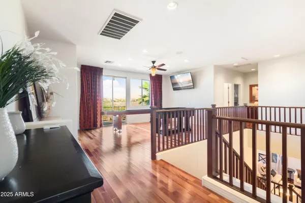 a dining hall with stainless steel appliances granite countertop a barbecue grill and couches chair with garden view