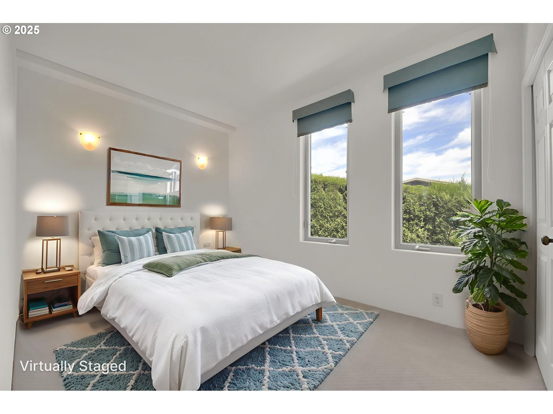 835 Willacade Court Springfield, OR 97477 - Photo 32 of 48 a bedroom with a bed and a potted plant