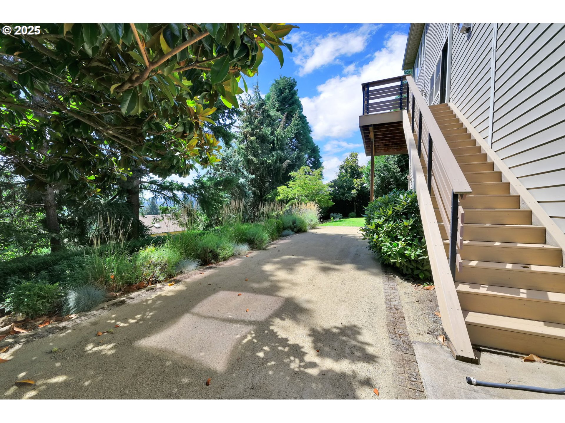 835 Willacade Court Springfield, OR 97477 - Photo 43 of 48 a view of a backyard with potted plants