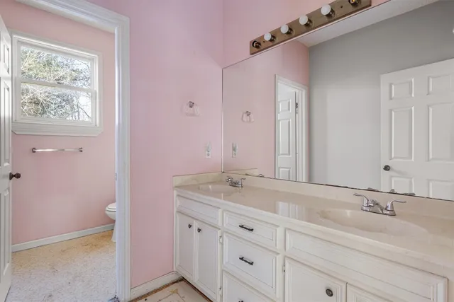 a bathroom with a shower and a bathtub