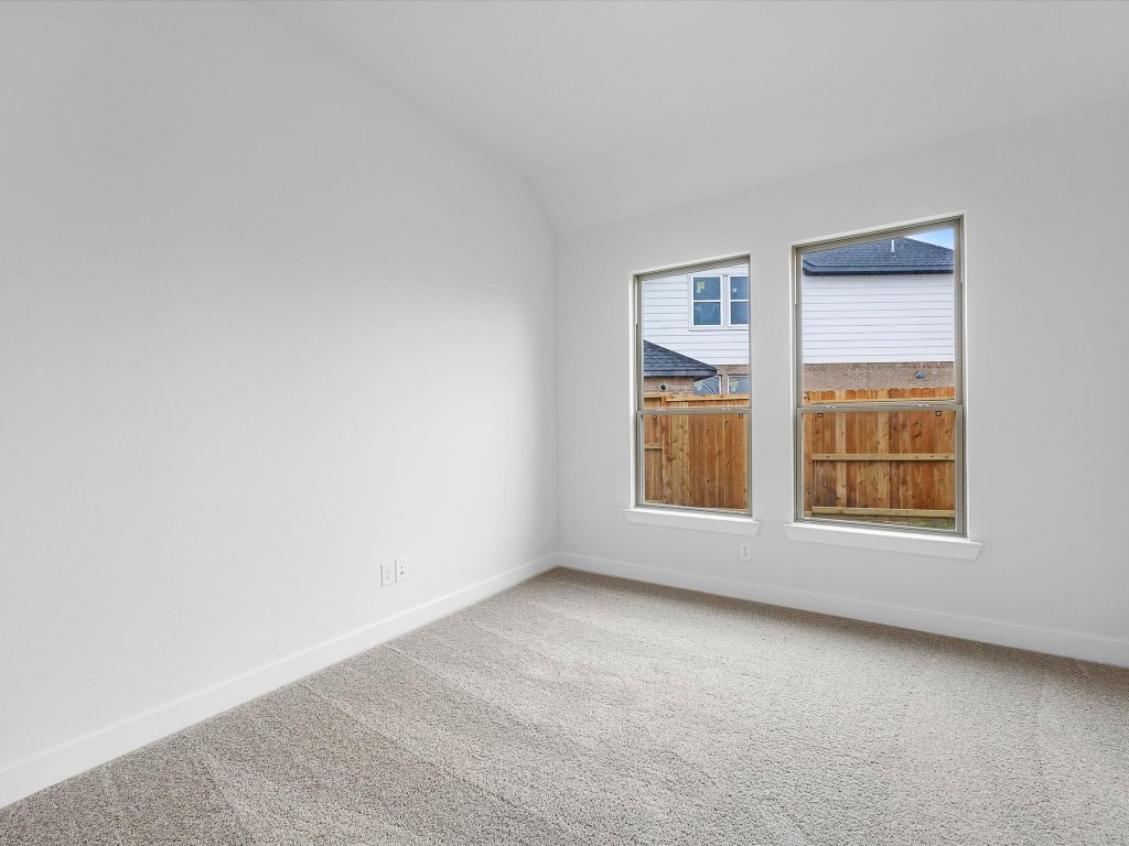 132 Meadow Beauty Lane Georgetown, TX 78633 - Photo 12 of 19 an empty room with a window