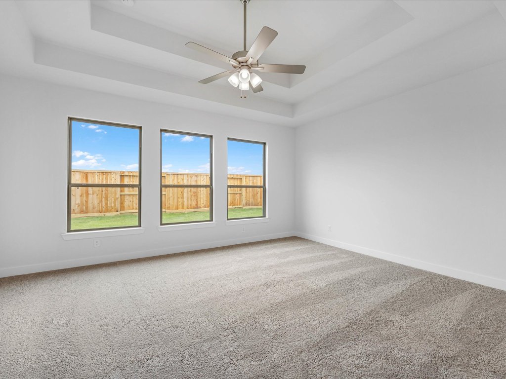 132 Meadow Beauty Lane Georgetown, TX 78633 - Photo 7 of 19 a view of an empty room with a window