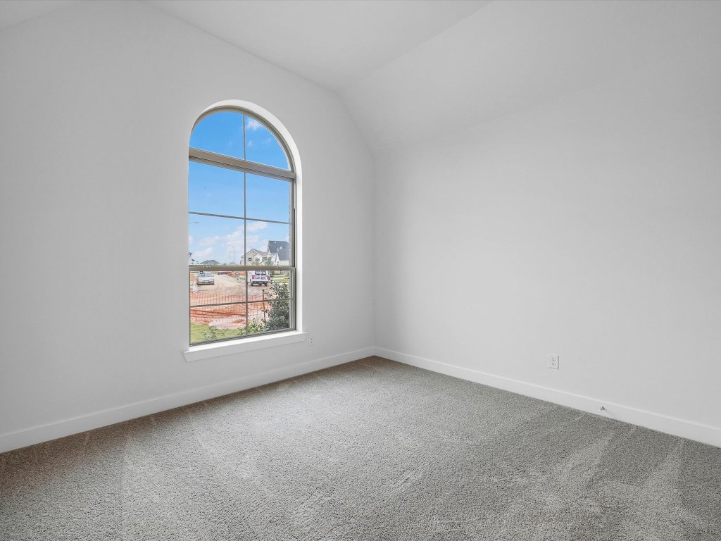 132 Meadow Beauty Lane Georgetown, TX 78633 - Photo 10 of 19 an empty room with windows