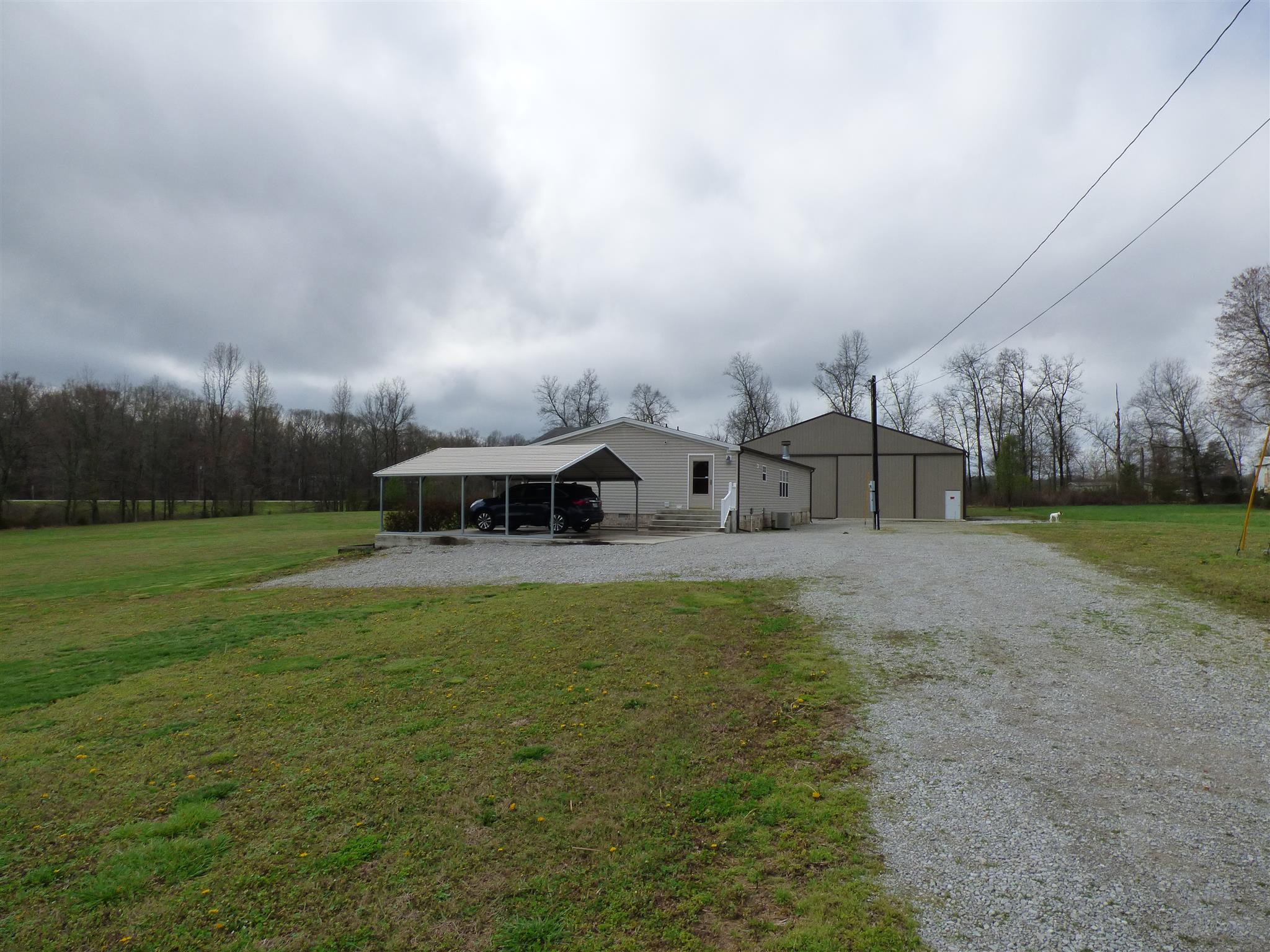 2022 Miller Crossroads Road Hillsboro, TN 37342 - Photo 20 of 24 The view from the driveway toward the home and carport.